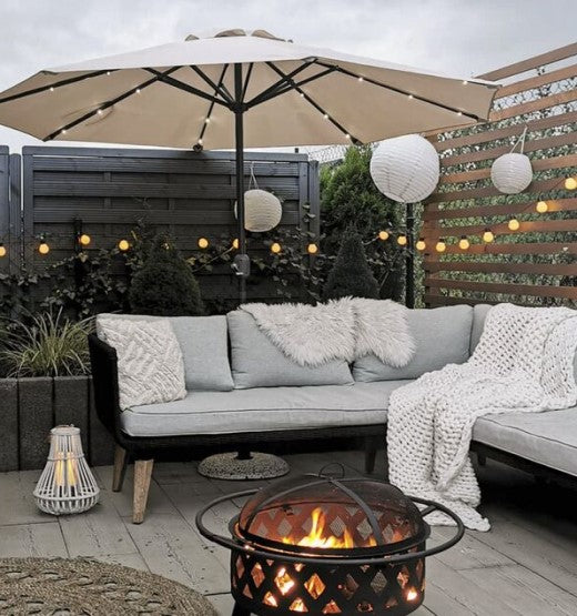 large garden parasol with led lights outside