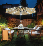 white garden umbrella with solar lights